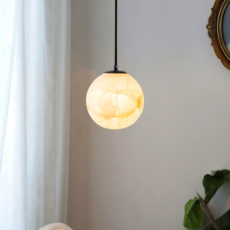 Lampe suspendue en marbre sphérique
