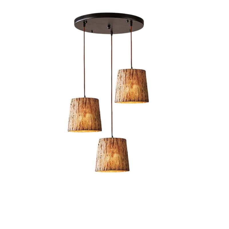 Lampe pendante en rondins de bois